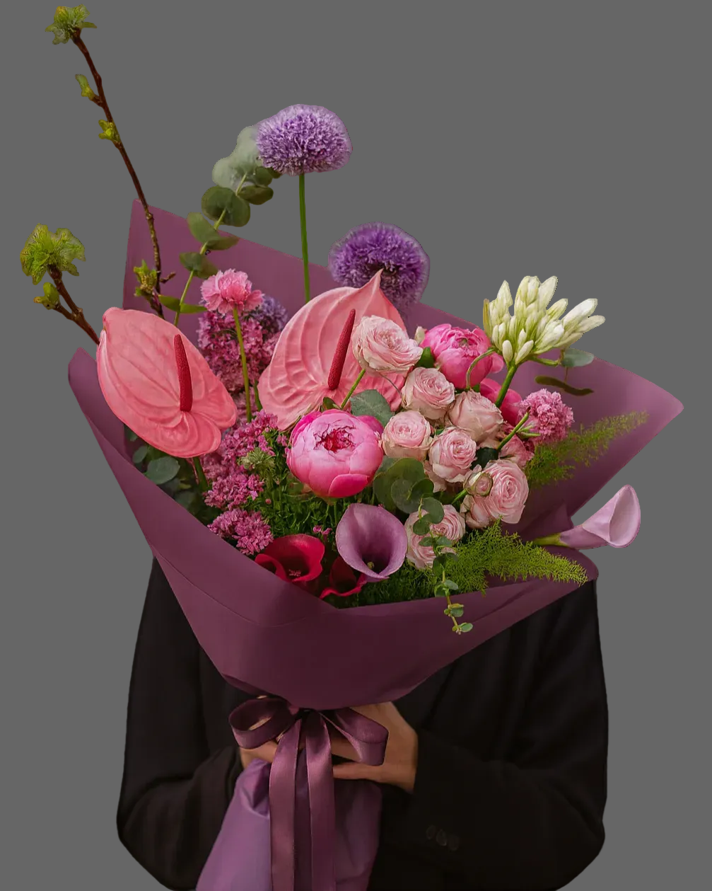 Bouquet June Allure with pink anthurium, peonies, garden roses and calla lilies in purple wrapping, luxury flowers with delivery in Miami and Sunny Isles.