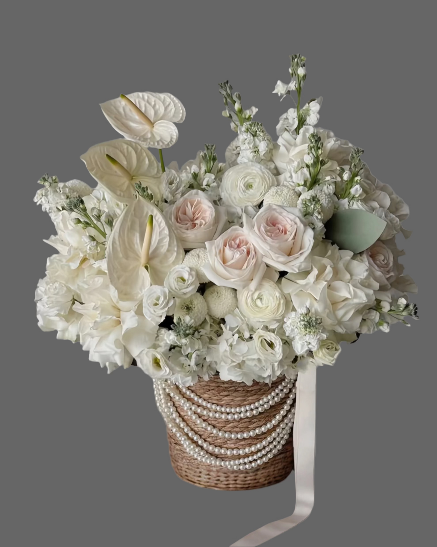  Luxury basket flower arrangements with roses, peonies, hydrangeas, and seasonal flowers. Elegant handcrafted gift baskets with delivery in Miami.