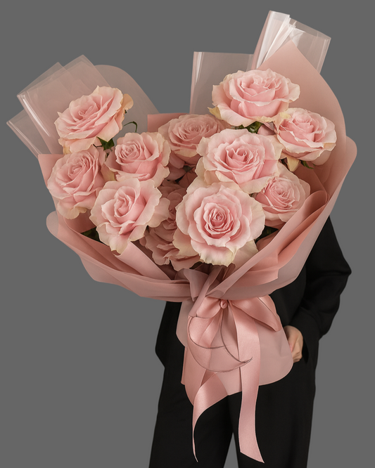 “PURE PINK DELIGHT bouquet with delicate pink roses in soft wrapping, romantic flower arrangement for delivery in Miami and Sunny Isles.”