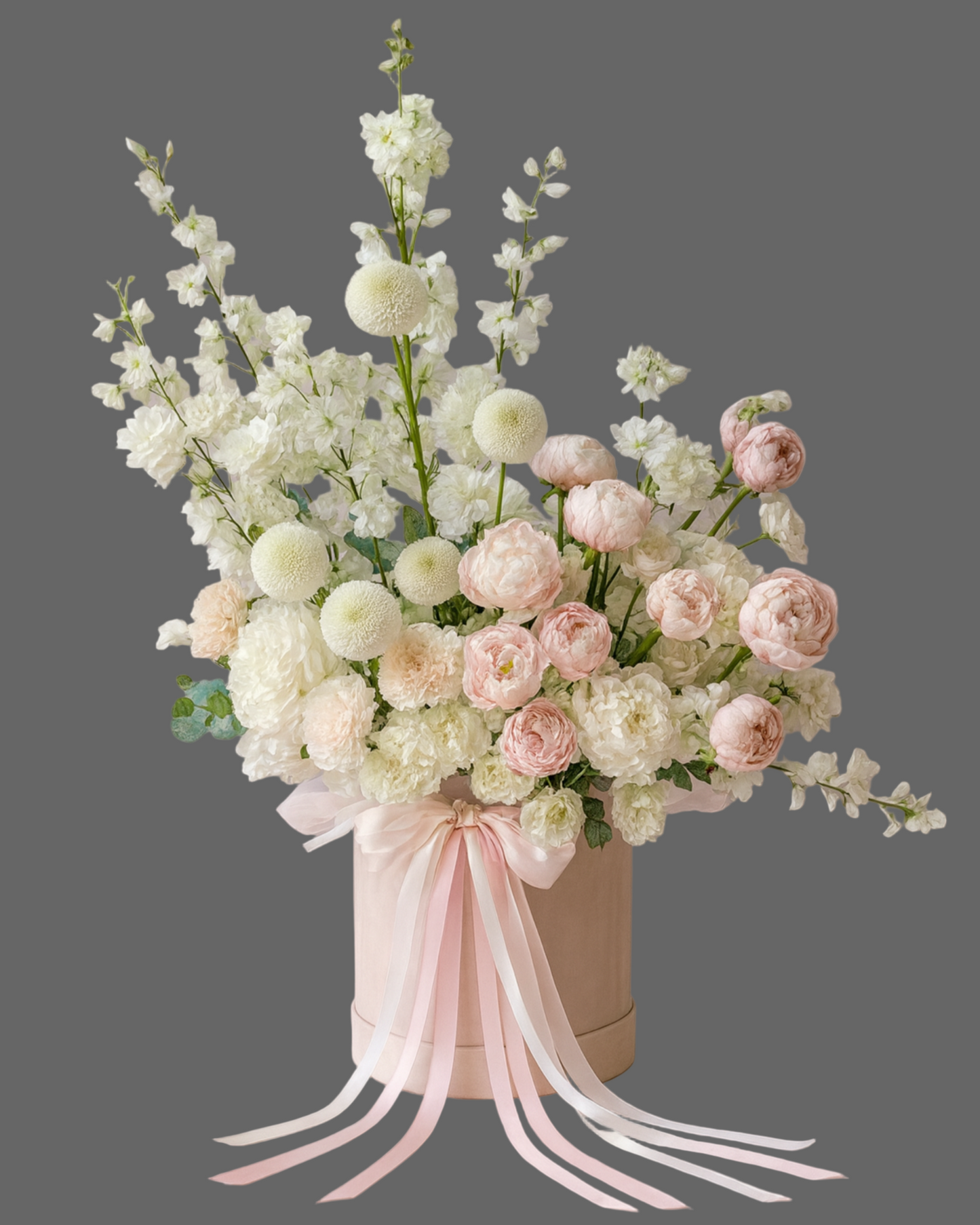 Flower Box Heavenly Blush with blush roses and ivory flowers in a beige hat box, elegant floral arrangement for delivery in Miami and Sunny Isles.