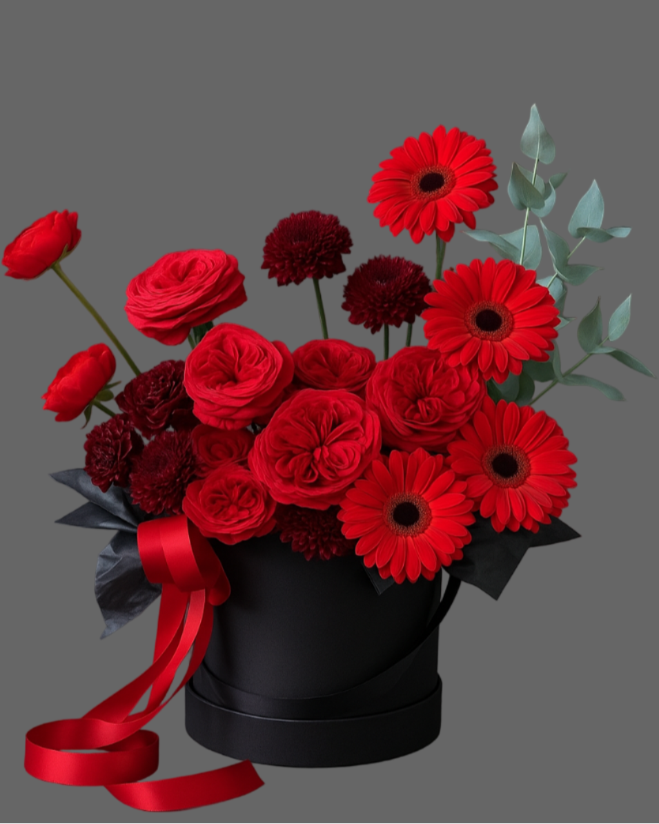 Luxury black hatbox with Red Piano roses, burgundy chrysanthemums, gerbera, and eucalyptus – premium flower arrangement Miami.
