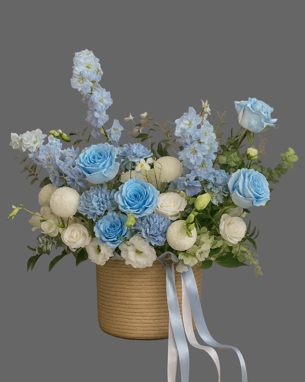 Blue Serenity flower basket with blue roses, hydrangeas, and white blooms. Elegant floral arrangement for delivery in Miami, Sunny Isles, Aventura, Hallandale, Hollywood & Brickell.