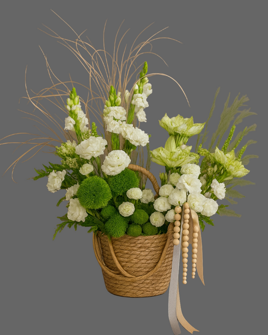Pure Harmony white and green flower basket with ranunculus, matthiola, and dianthus. Luxury floral arrangement for weddings, birthdays, and elegant gifts in Miami.
