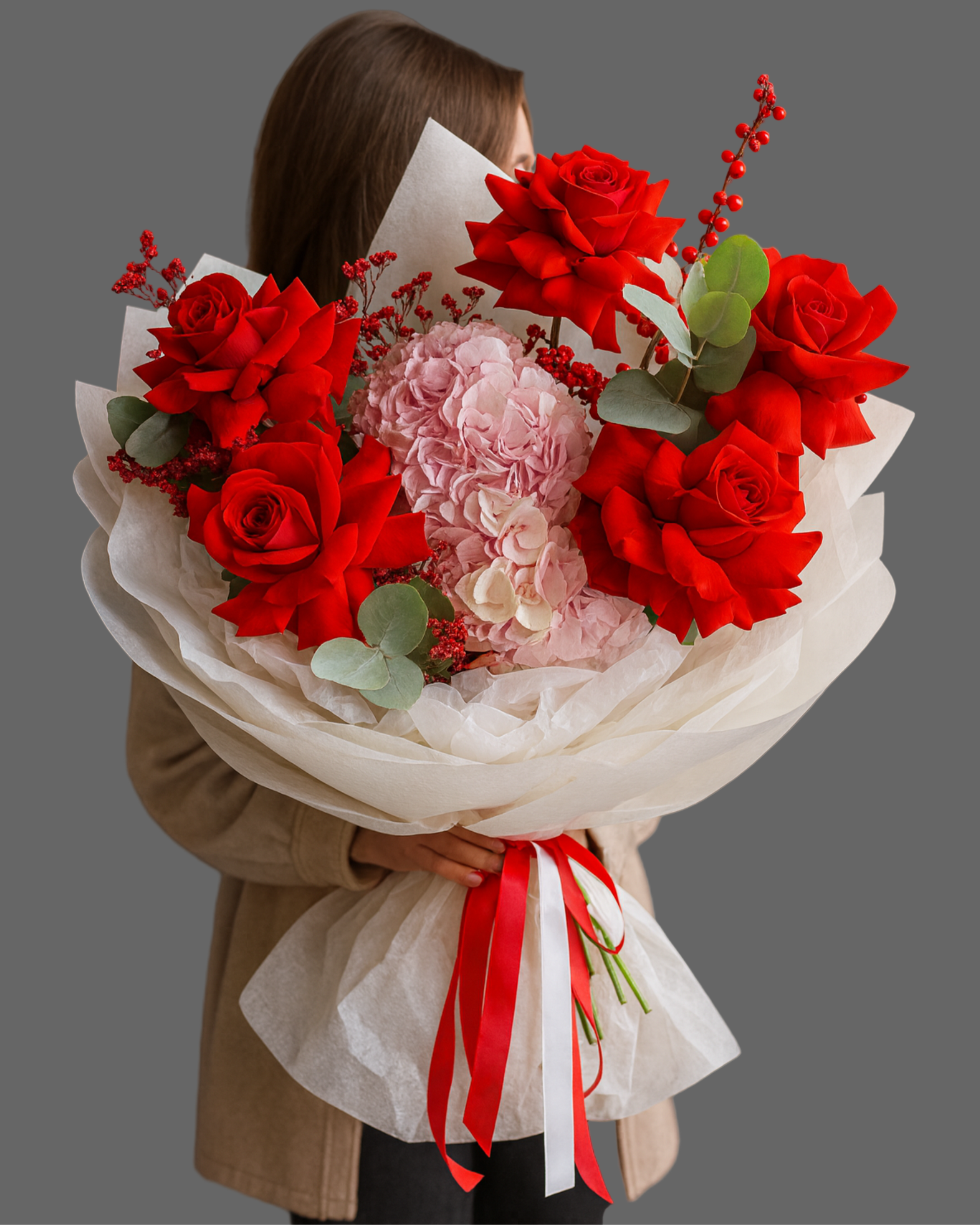 “Bouquet Carmen with red roses and pink hydrangea, wrapped in white paper with red ribbon, available for same-day delivery in Miami and Sunny Isles.”