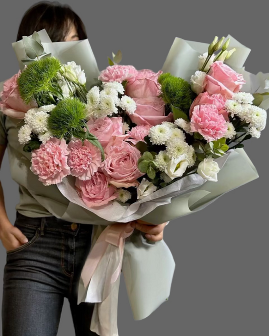 
“SIMPLE JOY bouquet with pink roses, carnations, green dianthus and white flowers, medium fresh bouquet for delivery in Miami and Sunny Isles.”