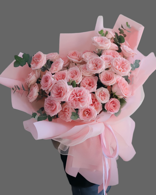 “Bouquet Isabella’s Rose with pink garden roses and greenery in pastel wrapping, luxury romantic bouquet for same-day delivery in Miami and Sunny Isles.”