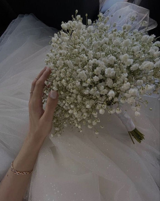 White baby’s breath wedding bouquet with satin ribbon handle, handcrafted in Miami
