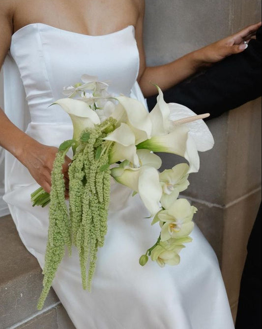 Cascading white orchid and calla lily wedding bouquet with amaranthus, handcrafted in Miami
